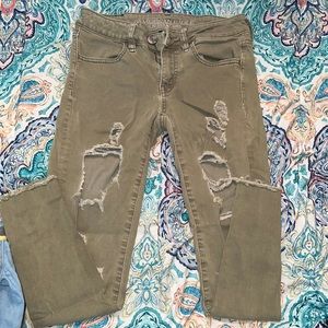 Green American Eagle Ripped Skinny Jeans